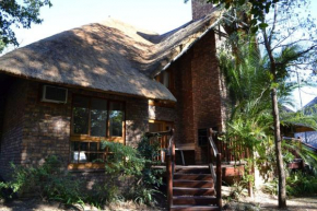 Гостиница Kruger Park Lodge - Golf Safari SA  Хазивью 